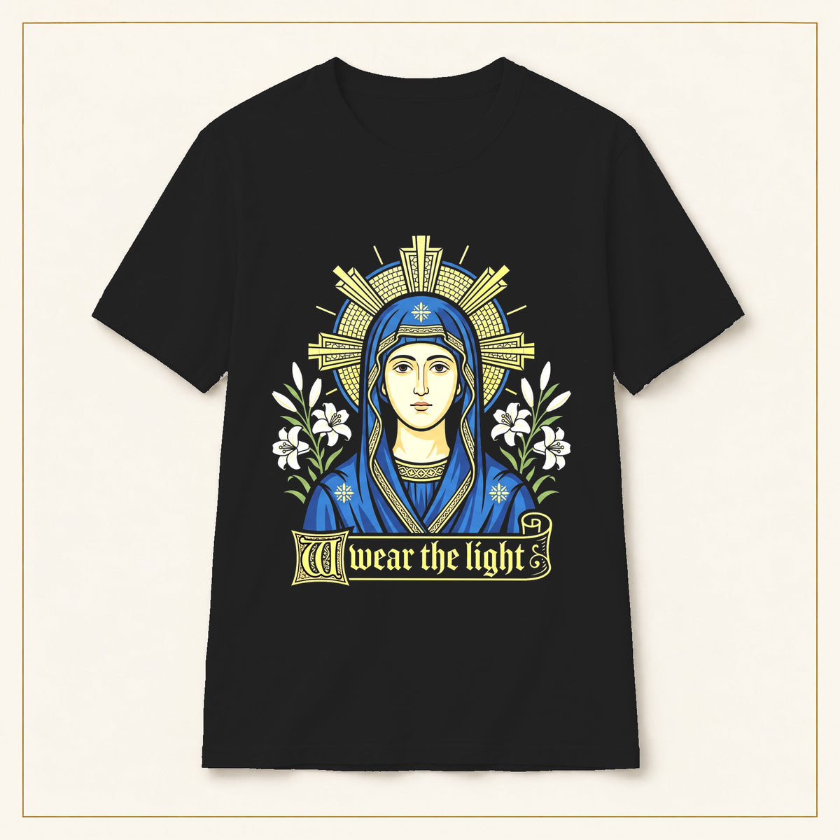 Mary Icon T-Shirt — I Wear the Light — black shirt on warm limestone with gold frame