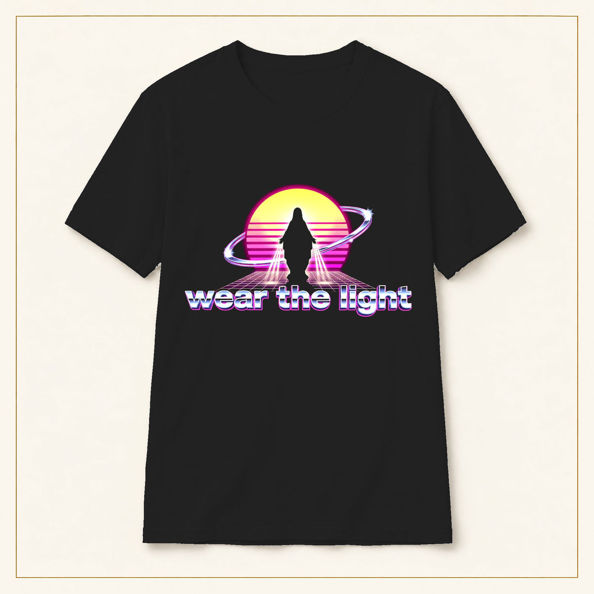 Retro Sunset Sci-Fi T-Shirt — Wear the Light — black shirt on warm limestone with gold frame